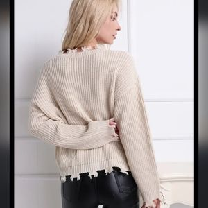 Versona distressed knit sweater